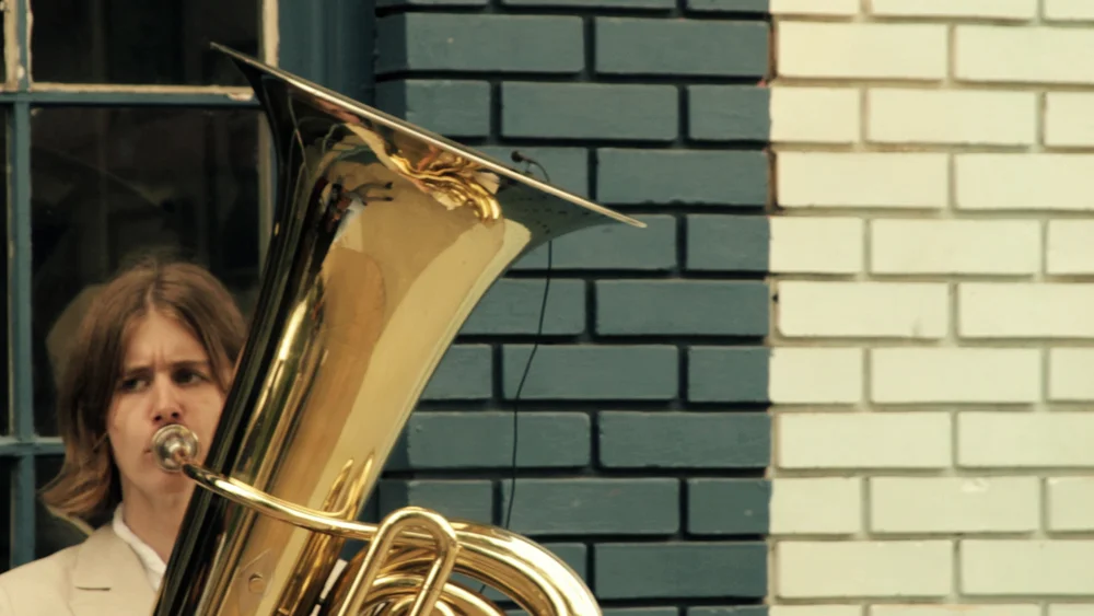 A young autistic woman details how playing a tuba in the streets of Atlanta has helped her sharpen her voice as an activist.