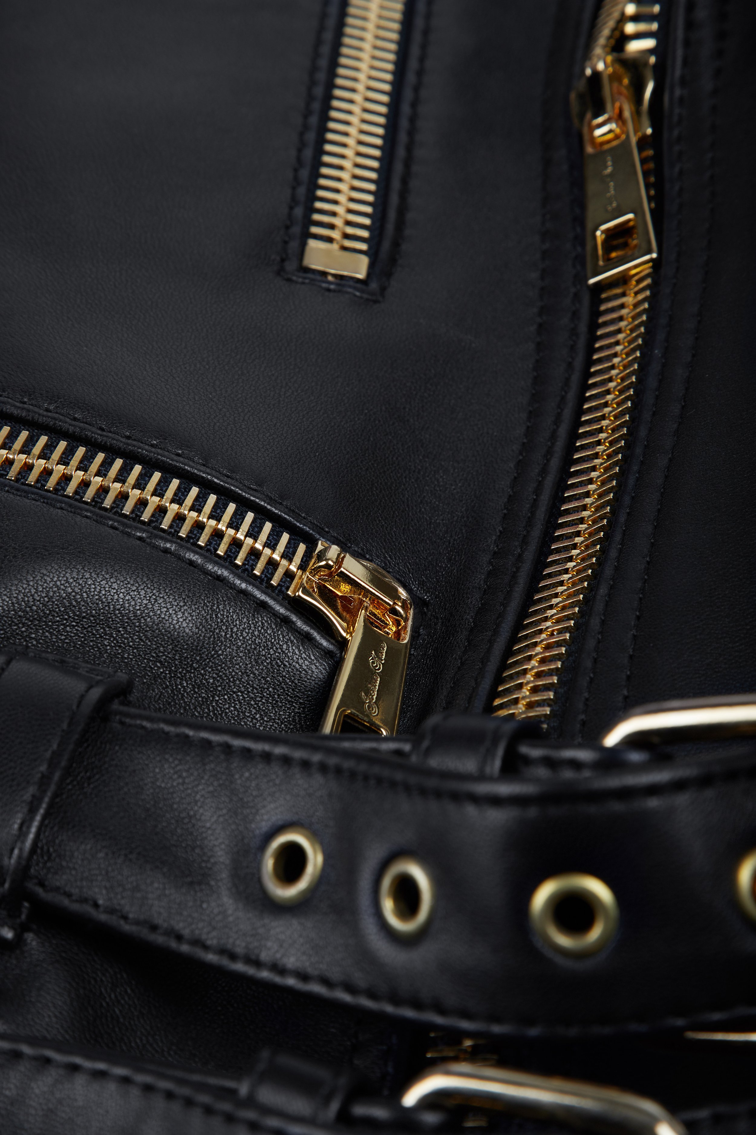 BLACK AND GOLD LEATHER BIKER ZIP DETAIL .jpg