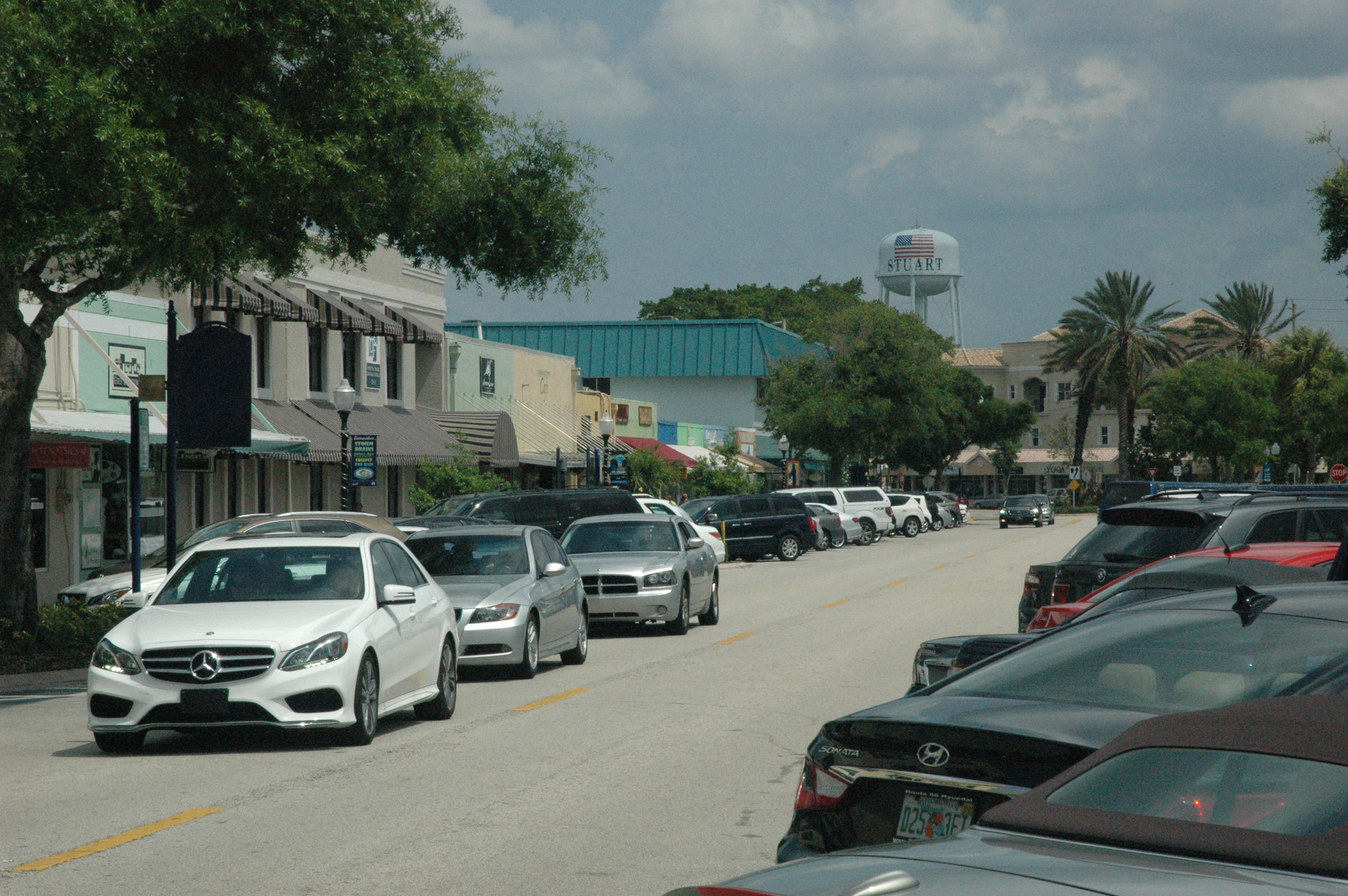Cars hunting for parking spaces in Stuart, Florida.
