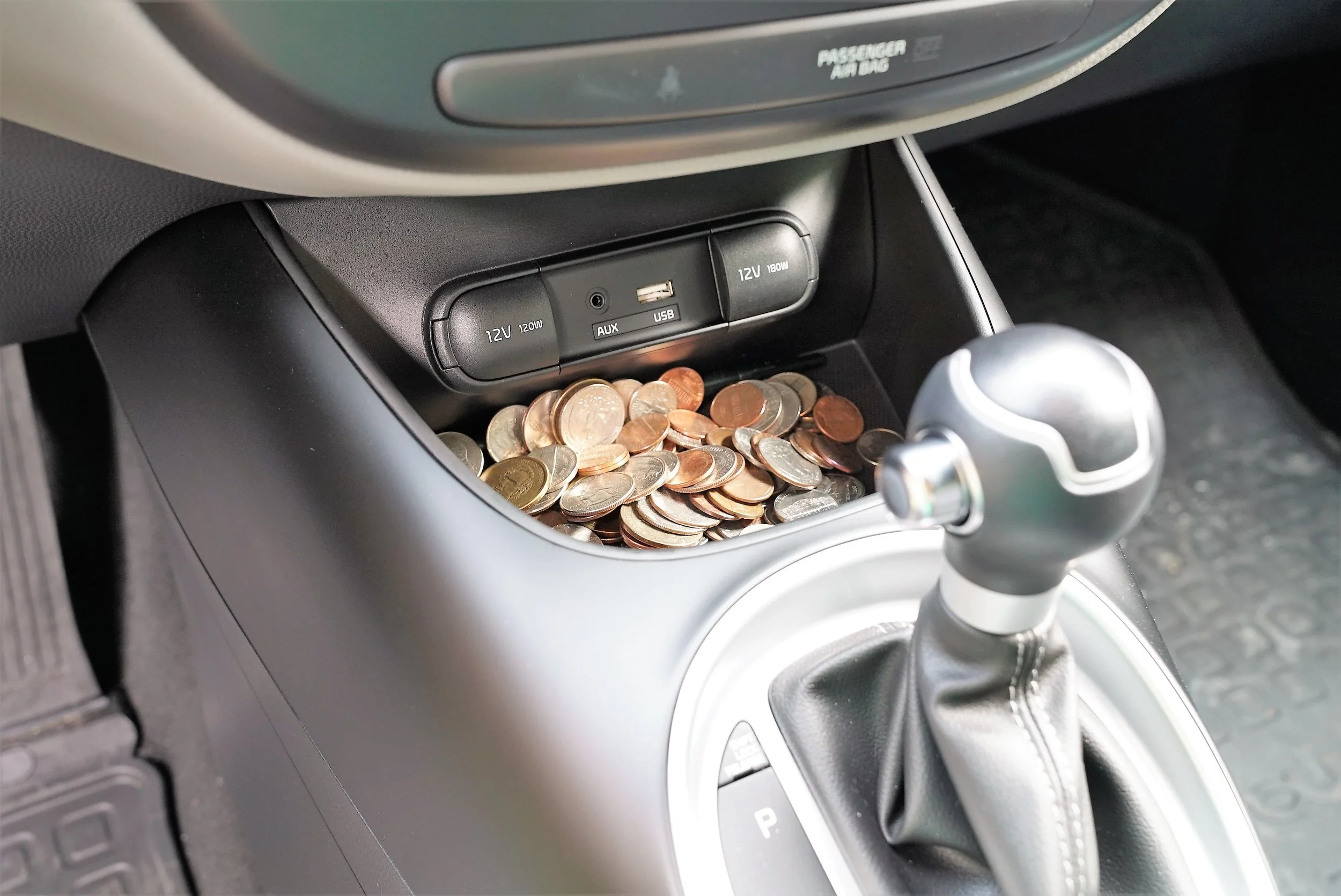 Coins are going to go missing when valet parking a car. (They might all disappear!) If you don't want to lose your change or any other items of value, then remove them from your car before handing over your keys to the valet.