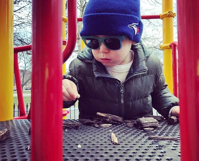 Invented his own game. involves a lot of bossing me around and some rocks and sticks