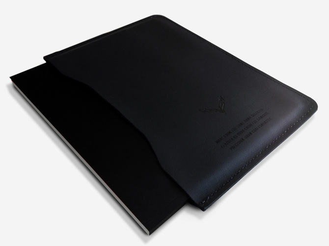 Mockup showing the book with the black leather sleeve.