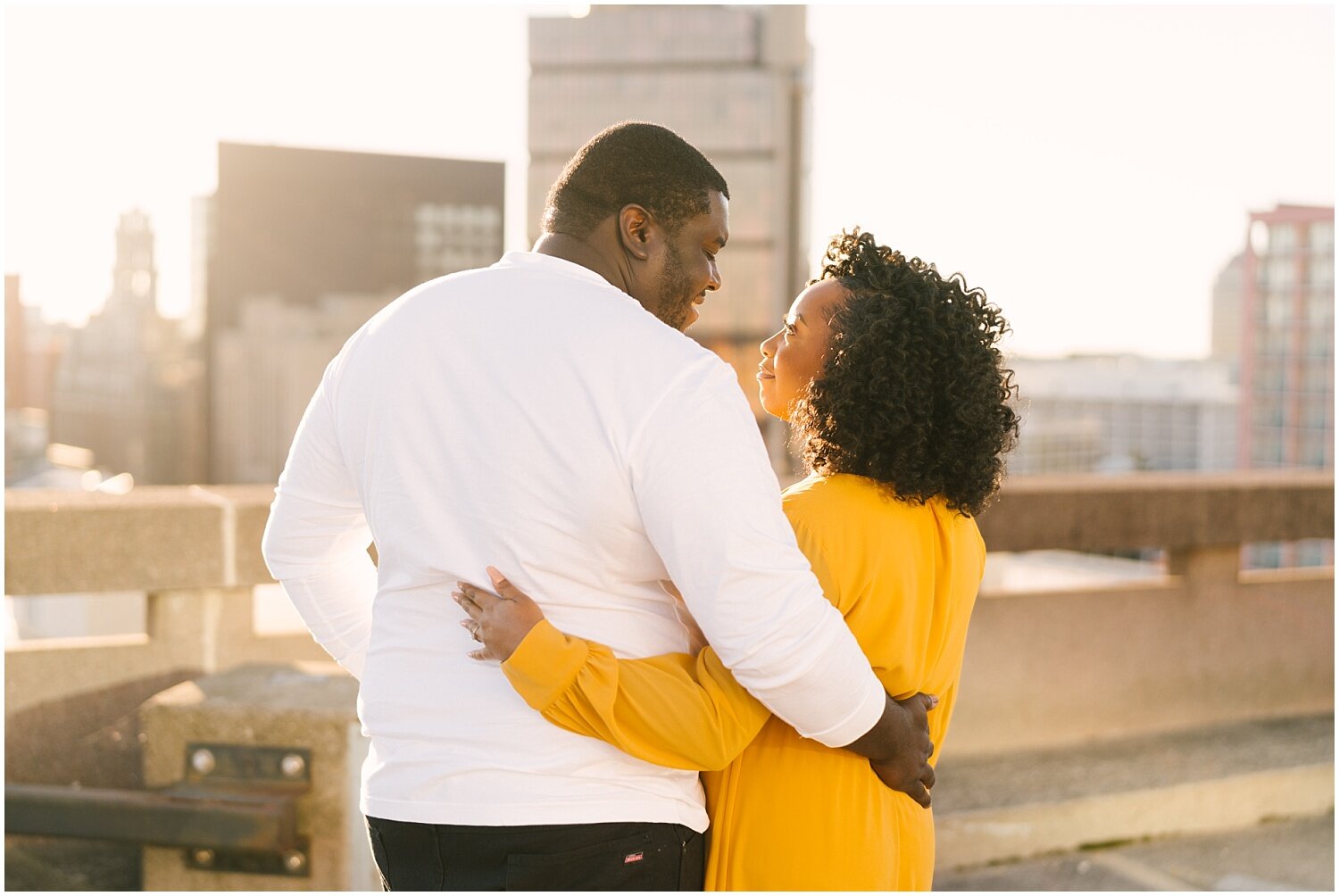 downtown+rochester+parking+garage+engagement+session+Rochester+wedding+photographer (7).jpg