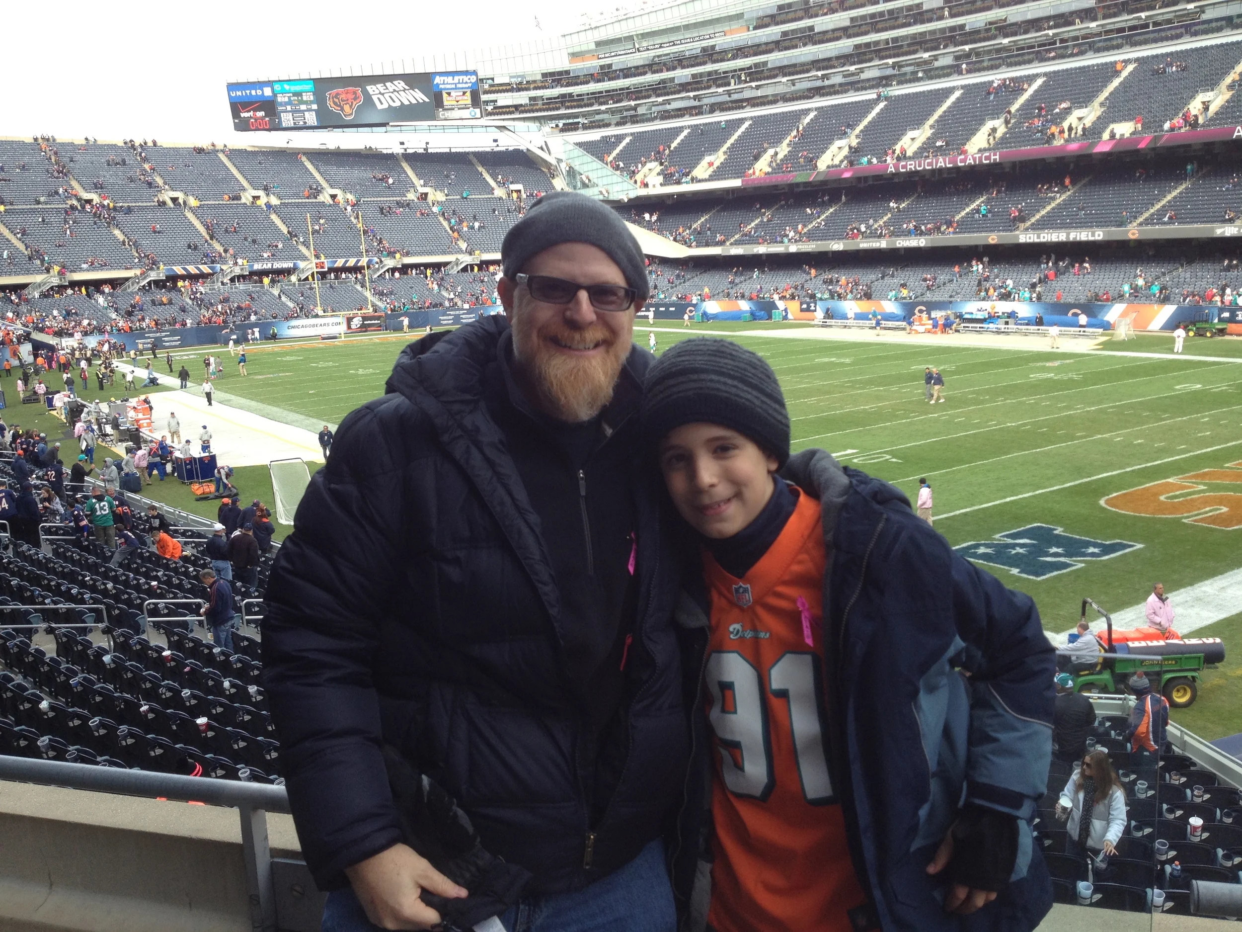 Professor Hurst, at a Dolphins game, with his son