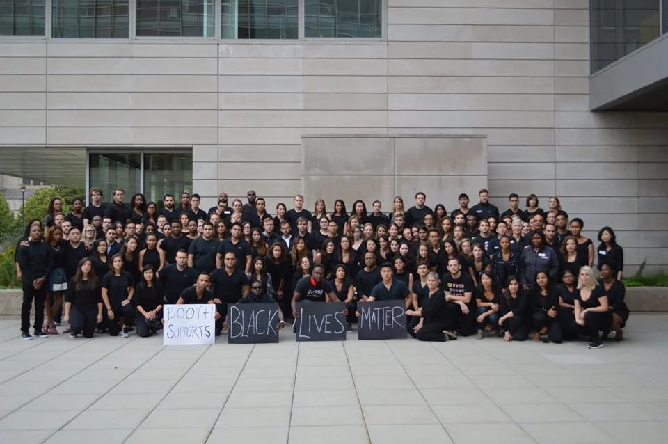 Photo Caption : Just back from summer break, dozens of Booth students, organized by AAMBA and HABSA co-chairs, came out to support the Black Lives Matter initiative on Friday Sept 23rd.