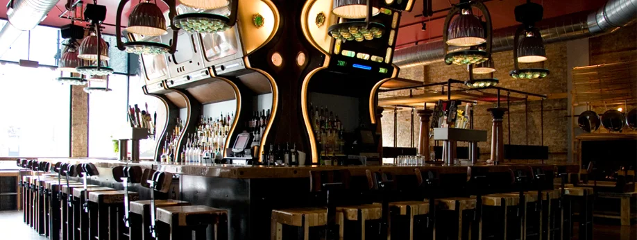 The bar at Simone's in Pilsen made out of recycled pinball machines. Photo courtesy of Simone's.