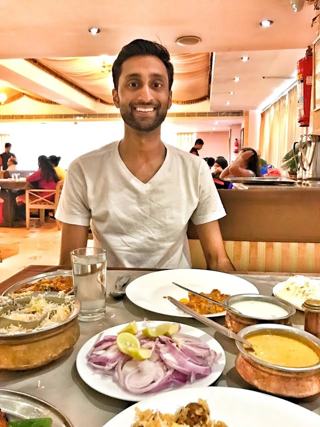 Pratik Desai enjoying his first, authentic Hyderabadi Biryani while on exchange at the Indian Institute of Management Ahmedabad.