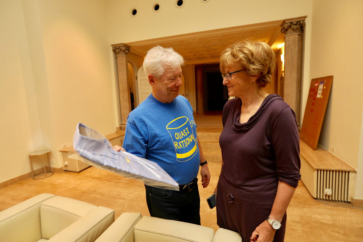 Thaler and wife France Leclerc discuss which shirt he should wear to interviews following his Nobel Prize win. Leclerc is an international photographer and former professor of marketing. Source: University of Chicago, Anne Ryan