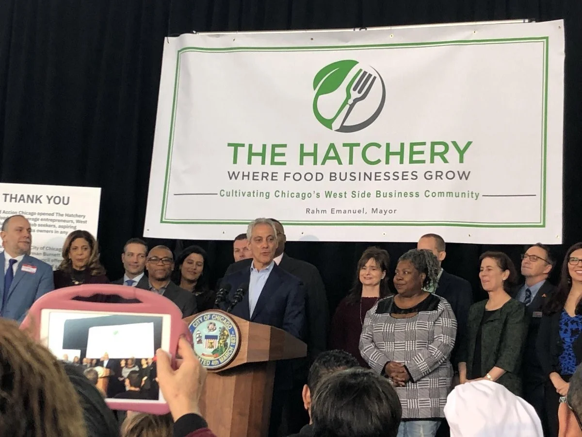 Chicago Mayor Rahm Emanuel speaks to a crowd of supporters and reporters at the grand opening ceremony of The Hatchery