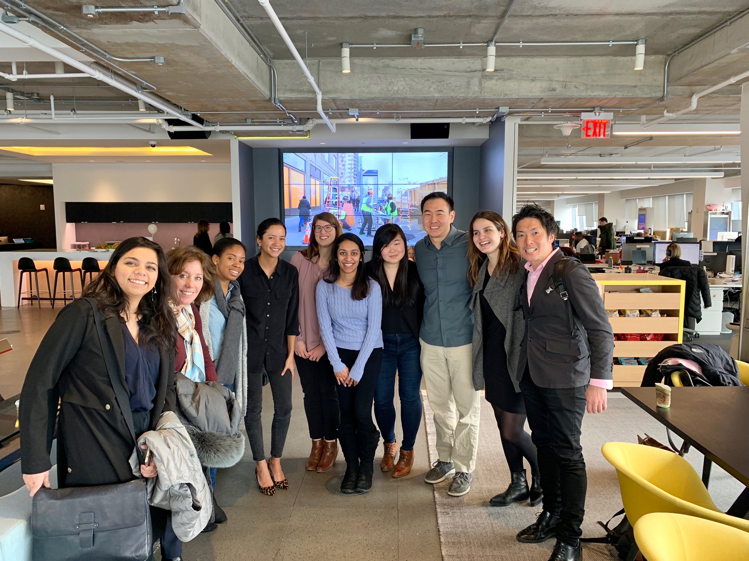 Booth trek participants with Kat Lau, business development lead (fourth from left), at Intersection