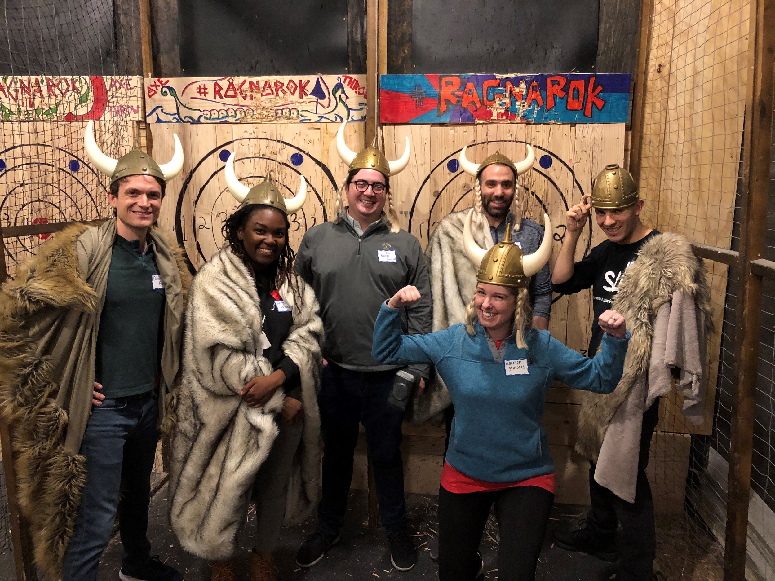 Booth Partners at an axe-throwing event