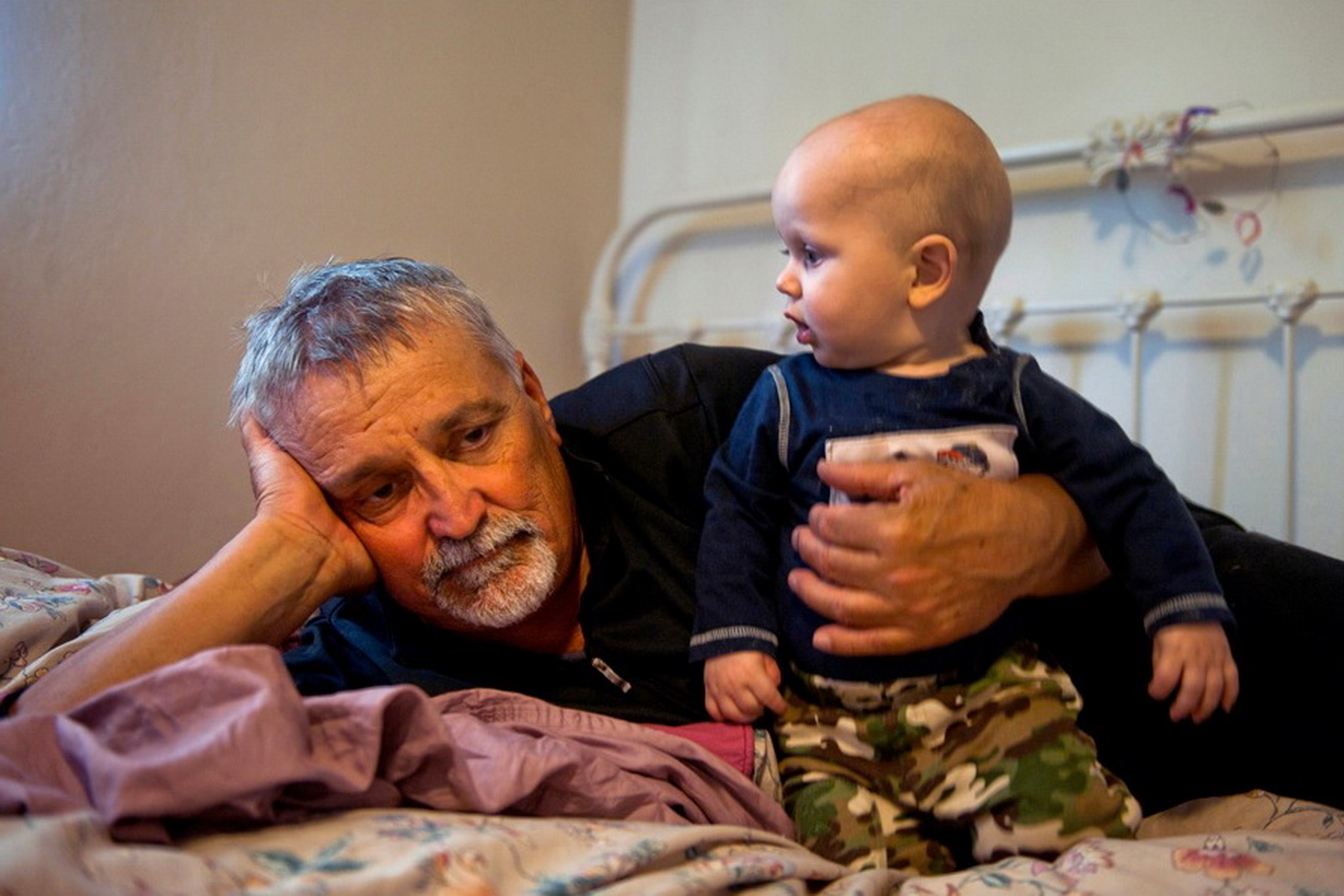 2013 Pulitzer Finalist “ A Grandfather’s Sorrow and Love. ” Don Hatfield, 64, snuggles his grandson Alex, the youngest of three children of his daughter Rachel Winkler who was killed Feb. 27, 2012, in her Cameron Park, California home. © Renée C. Byer/Sacramento Bee/ZUMAPRESS.com
