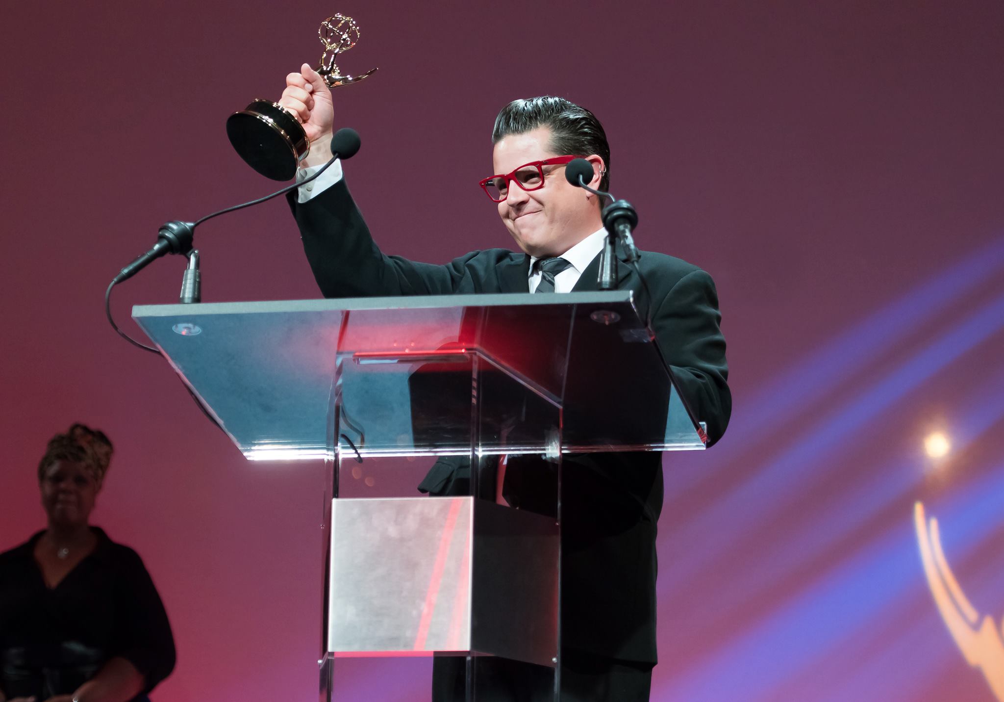 Mike Kepka accepting one of his four Emmys. © Richard Lau