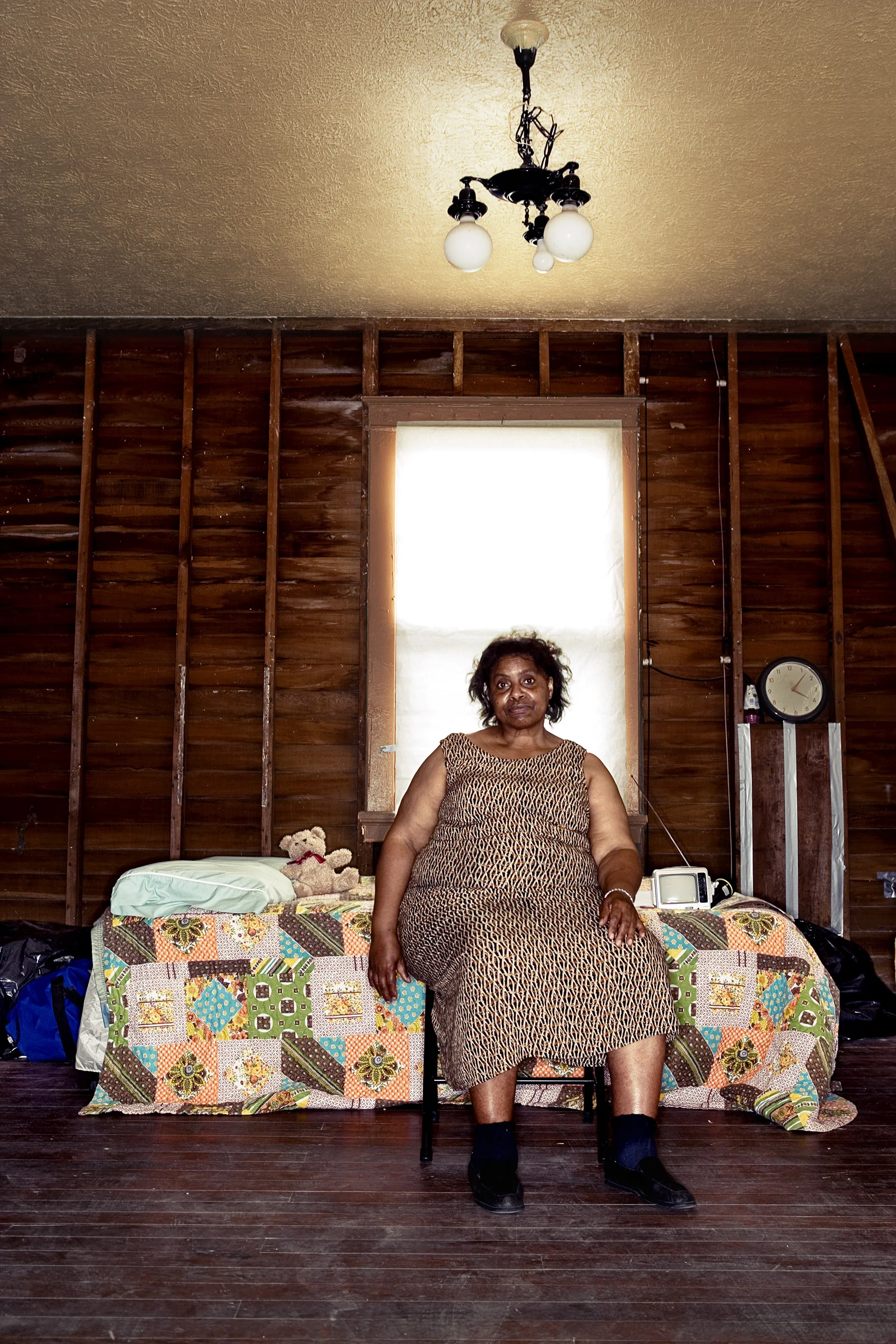 Post Hurricane Katrina: Carolyn on bed © Stephen Wilkes