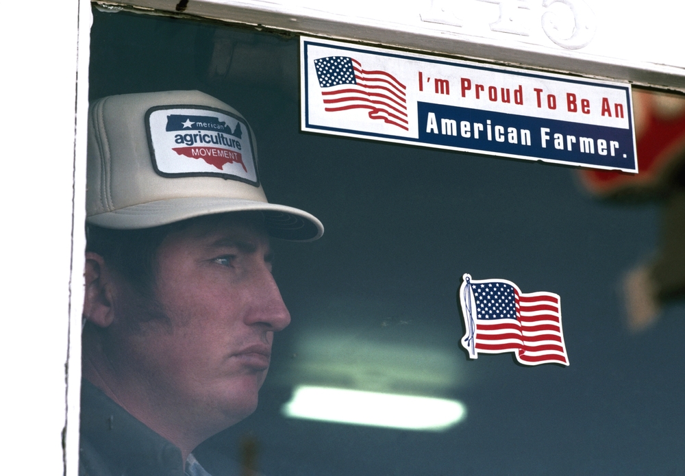  A farmer and member of the American Agricultural Movement stares out of the door of his home in Campo, CO. February 1983&nbsp;© Jean-Pierre Laffont 