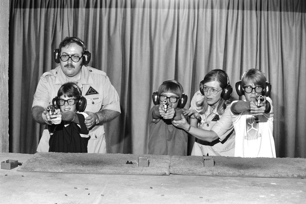  Children are taught how to handle firearms at a special school in College Station, TX, created by retired colonel Sid Loveless. June 1981 © Jean-Pierre Laffont 