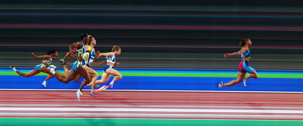  Marion Jones wins the 100m final at the Sydney Olympic Games.&nbsp;© Bill Frakes/Sports Illustrated 