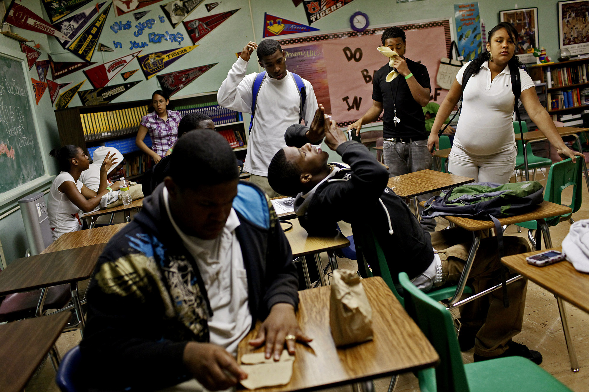 Milli Zepeda, 17, almost nine months pregnant, waits with her class for instructions on where to go from a substitute teacher at Sam Houston High School. ©Lisa Krantz/San Antonio Express-News/ZUMA Press