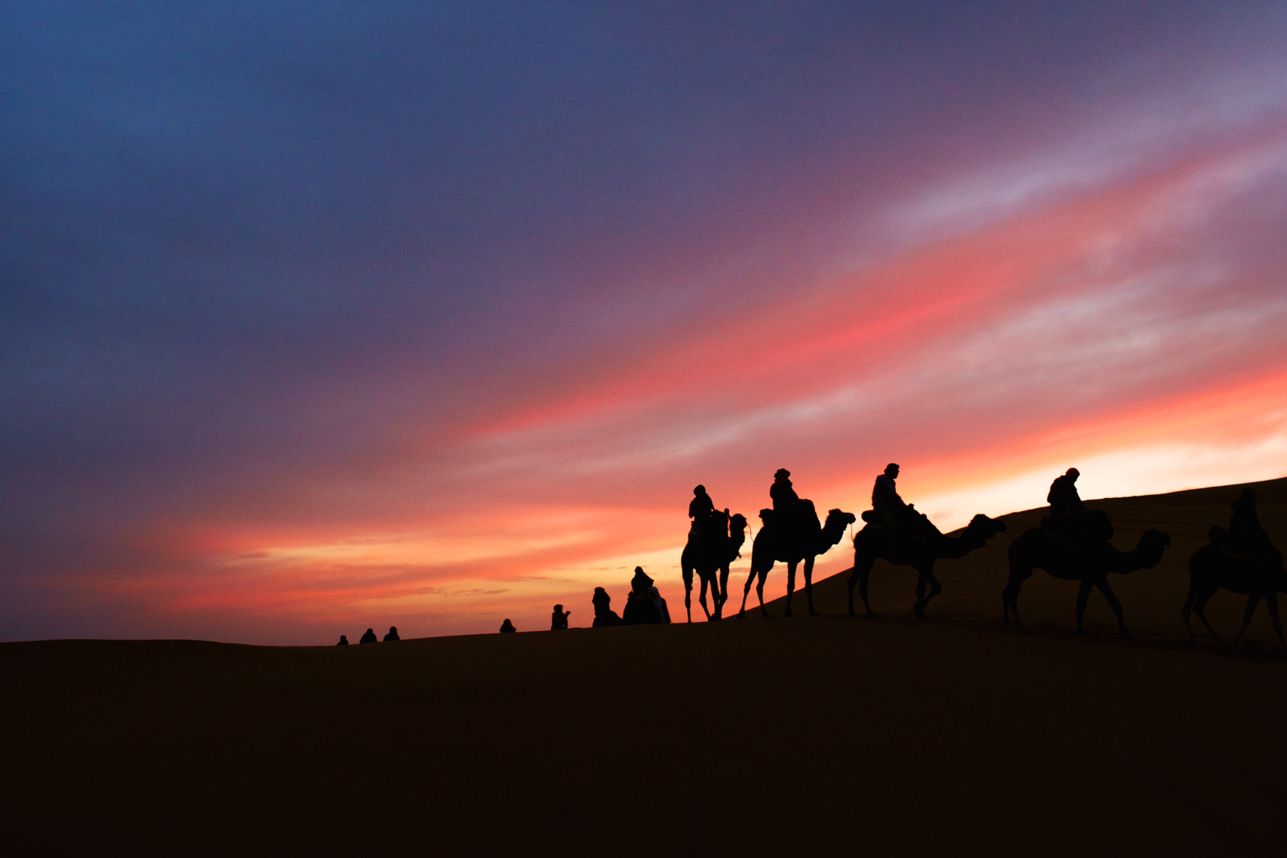 Travel: A tour group ventures into the Sahara Desert for an overnight camping trip in Morocco. © Sol Neelman