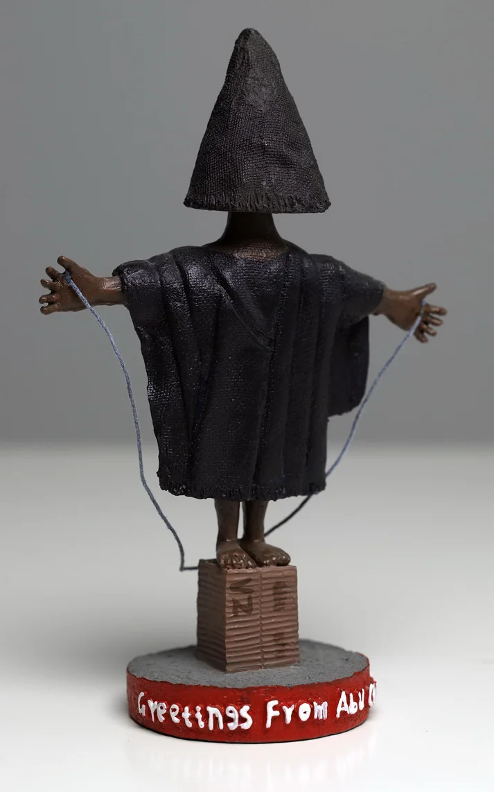 From America the Gift Shop: Abu Ghraib bobble-head figurine. Molded resin, 7”, 2008 © Phillip Toledano
