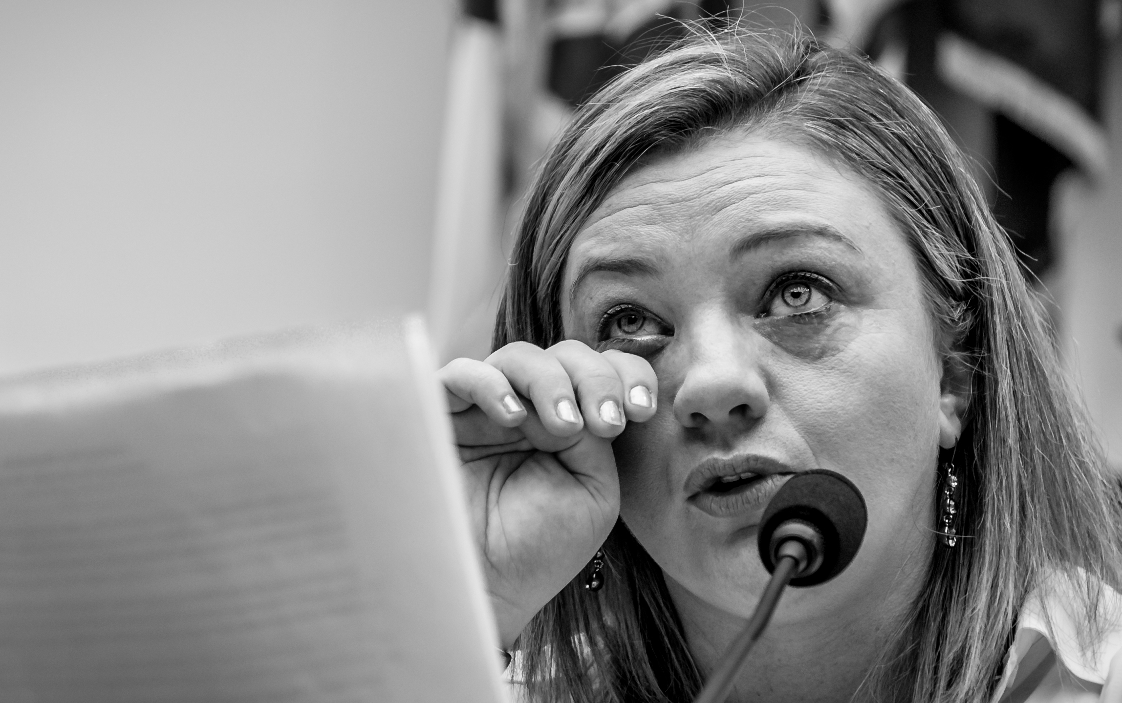 The War Within: TSgt Jennifer Norris was drugged and raped by her recruiter after joining the US Air Force when she was 21 years old. She breaks down while testifying before the sparsely attended House Armed Services Committee hearing on Capitol Hill. © Mary F. Calvert/ ZUMAPRESS.com