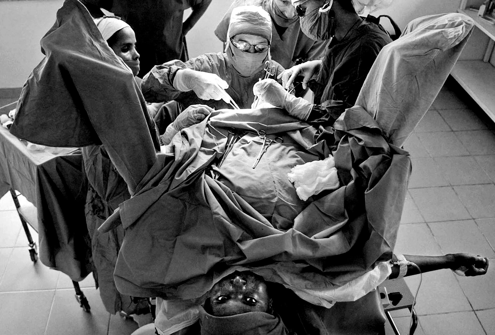 Trail of Tears: Fighting Obstetric Fistula in Ethiopia: A fistula patient goes through the 30-minute surgery under local anesthesia in the simple but clean operating theatre. © Mary F. Calvert/ ZUMAPRESS.com