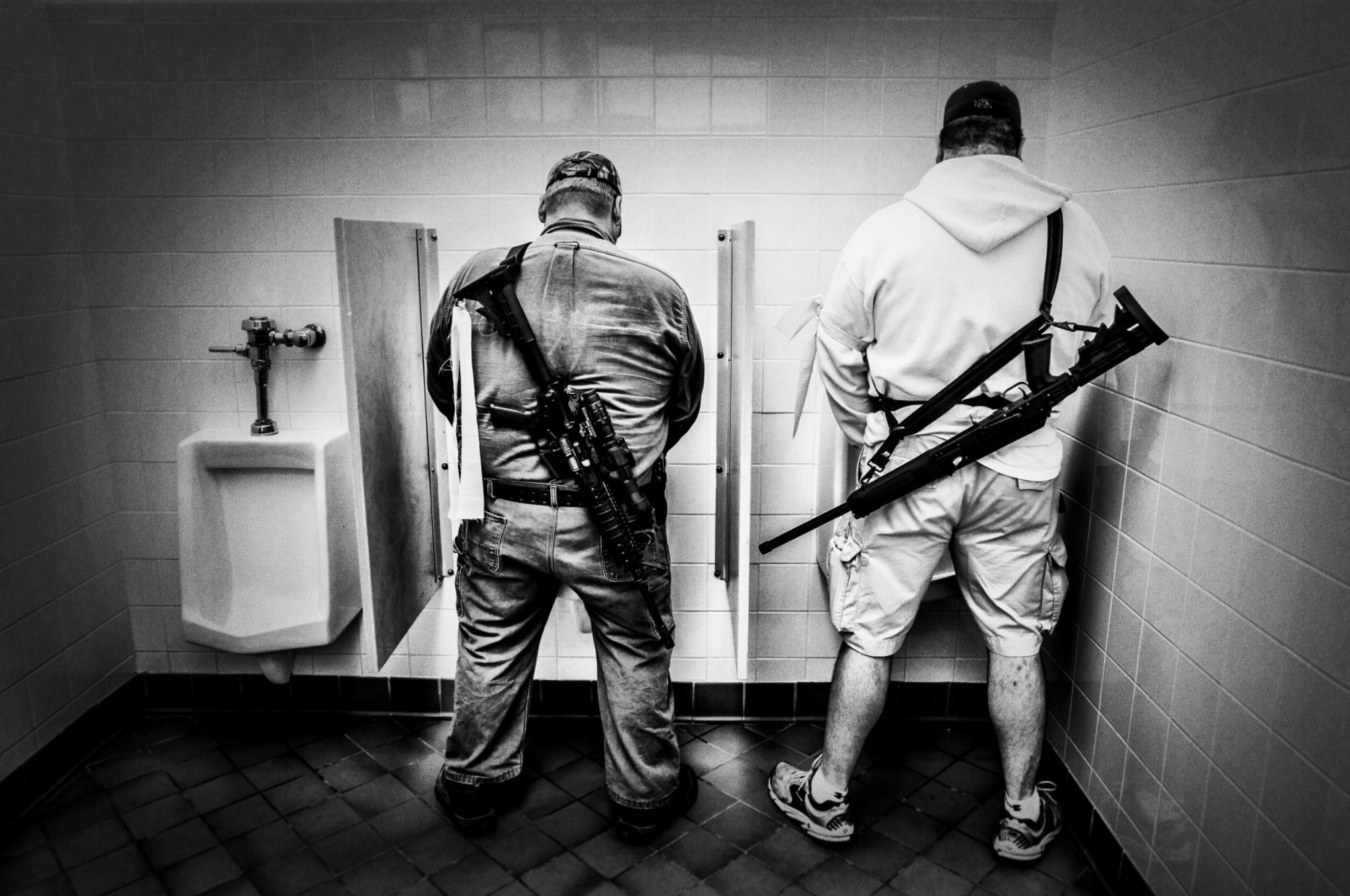 Nature Calls: A break during a 2nd amendment rally in Washington DC. © Mark Peterson/ReduxPictures