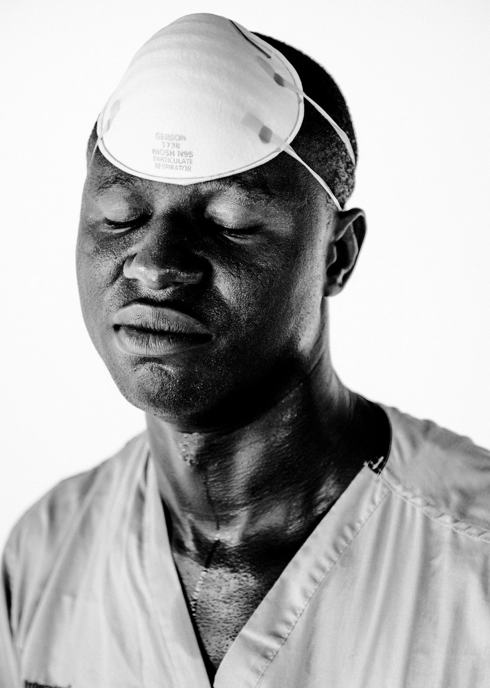   J. Sam T. G. Siakor, 30, water, sanitation and hygiene supervisor. October 2014 © Daniel Berehulak for The New York Times  