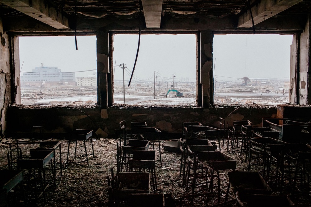   Chairs are strewn in a classroom of the Kadonowaki Elementary School in Ishinomaki, Japan. As the one-year anniversary approaches, the areas most affected by an earthquake and subsequent tsunami that left 15,848 dead and 3,305 missing, according to