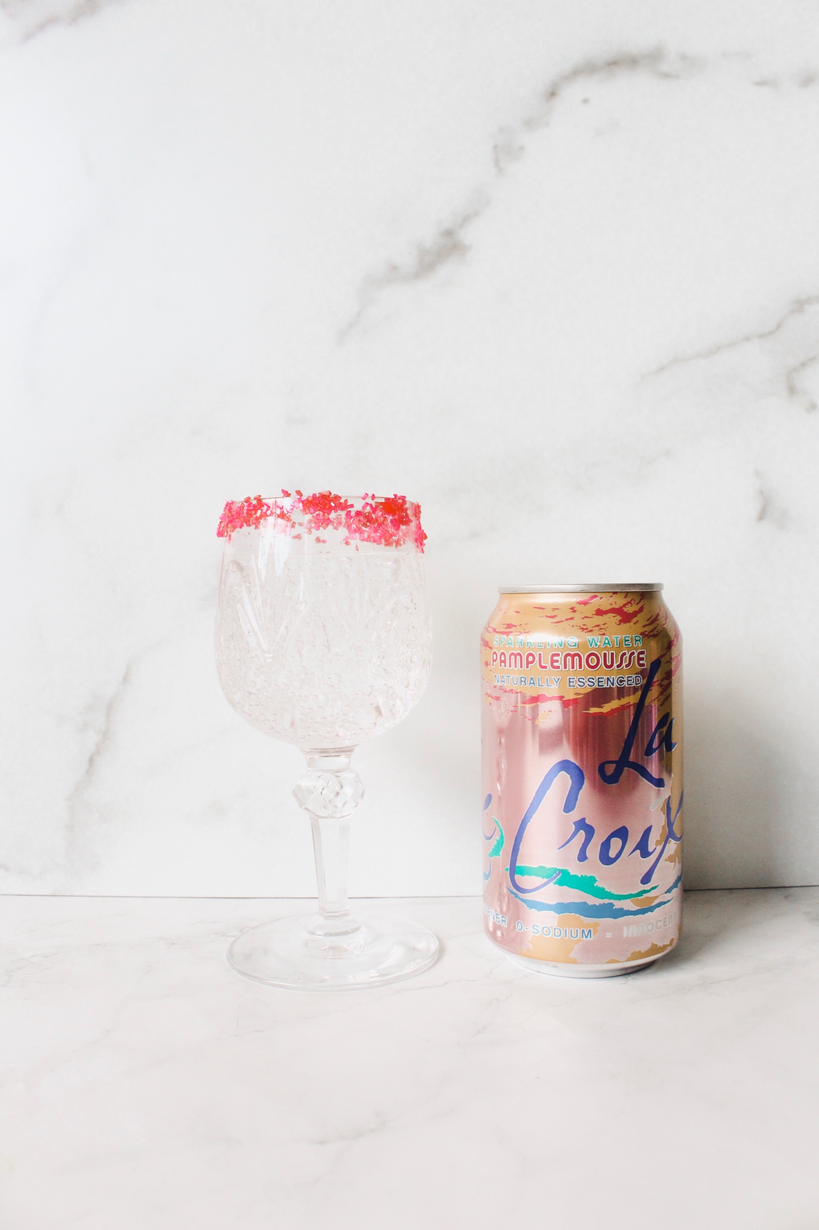 Sweet Tequila Grapefruit 1/2 cup of Grapfruit (Pamplemousse) La Croix 2 shots of Vodka Finish with a sugar rim ** If too strong add fresh grapefruit juice