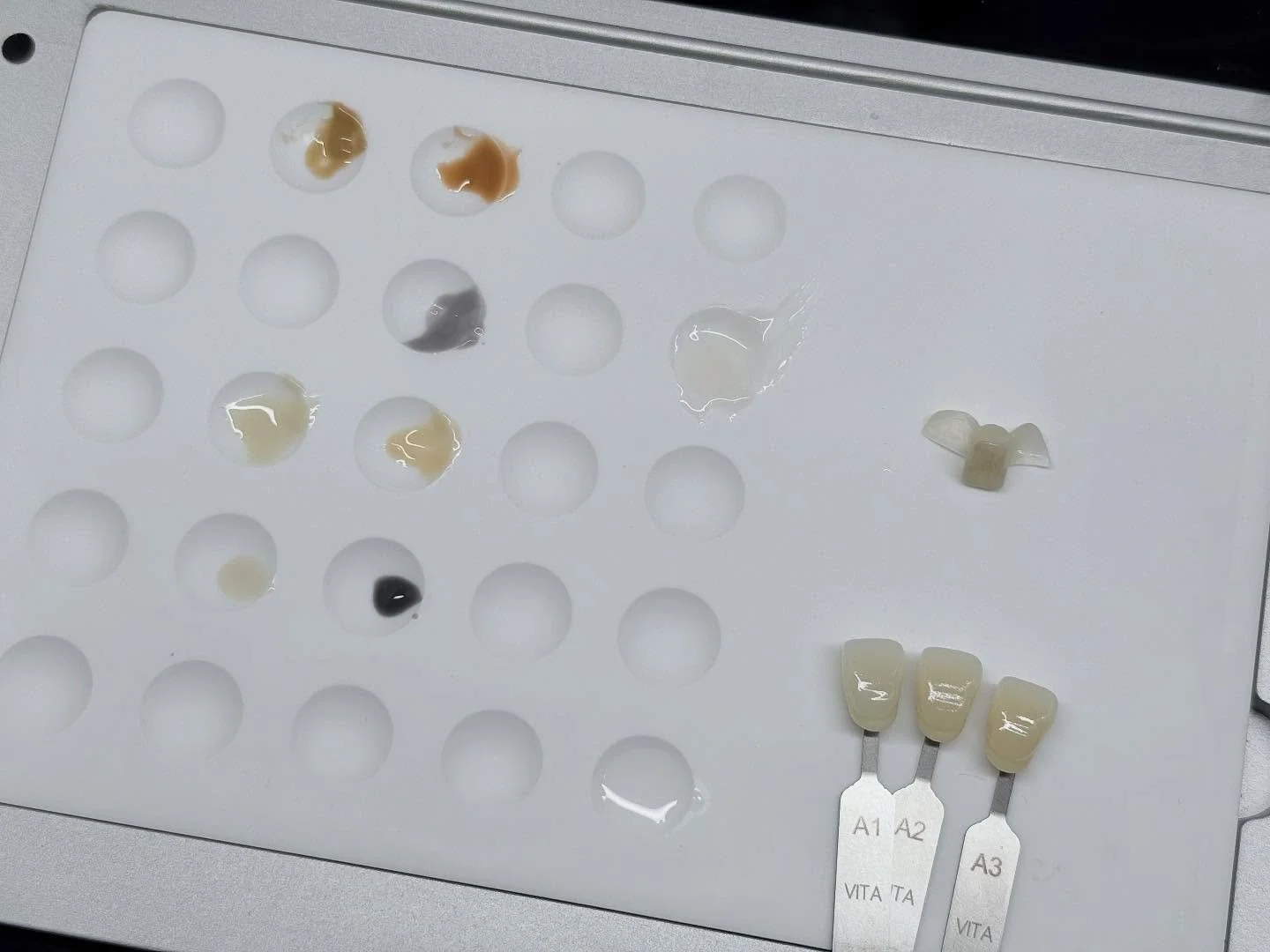 What makes porcelain look like it&rsquo;s your own tooth?
A tooth is not just one color or a shade  of white.  It has various color details, and unless the details are replicated the porcelain tooth will jump out like a sore thumb.
In this case seven