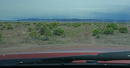 FAINT TRACKS THROUGH SAGEBRUSH FLATS