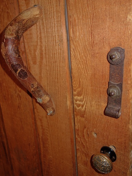 It looks like when the door hardware failed it was replaced but not removed.