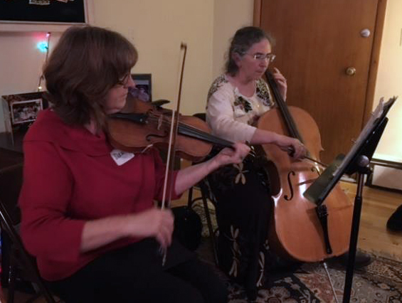 Dawn and Barbara lead the Christmas carols with their terrific instrumentals. 