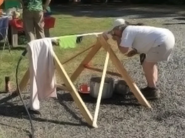 GSOC First Lady Barbara Smoody demos one use of the spigot setup.