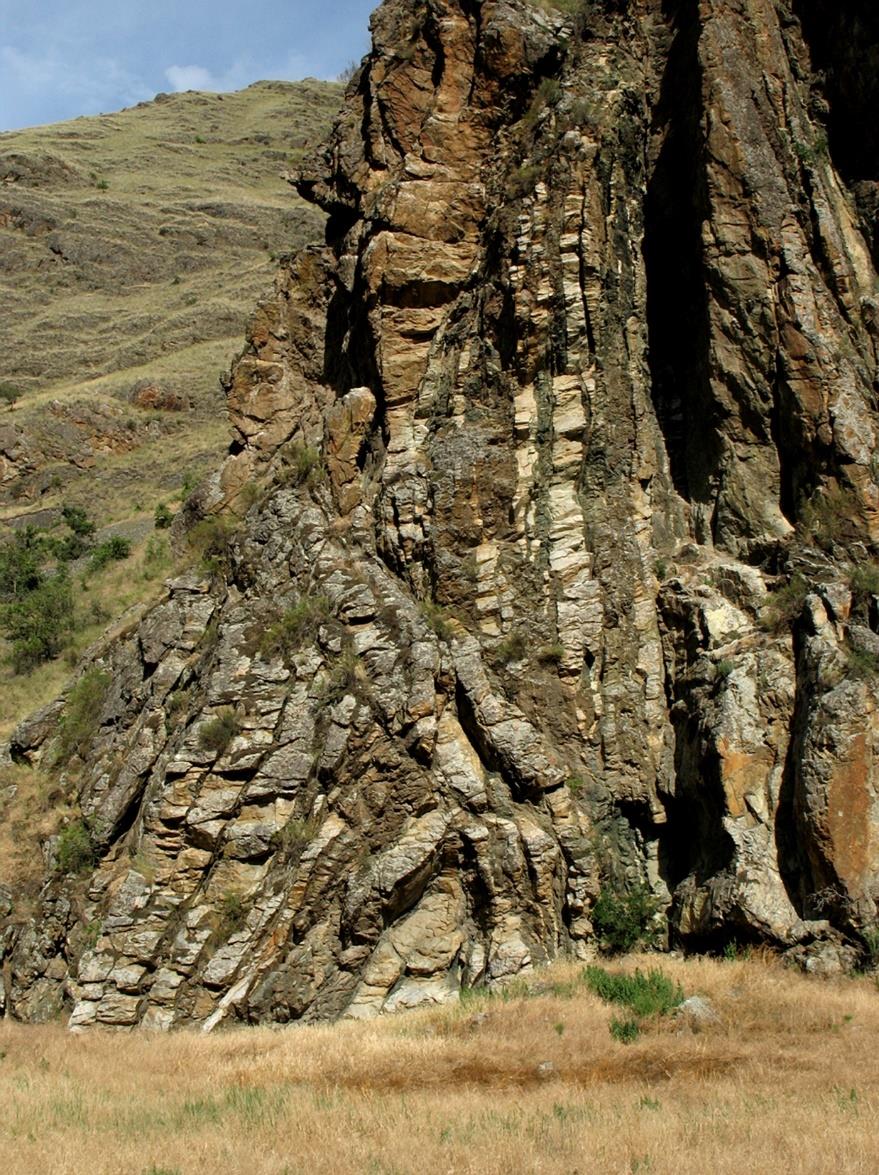 Alternating bands of andesite and rhyolite from the Cougar Creek Complex. Photo by Ellen Morris Bishop.