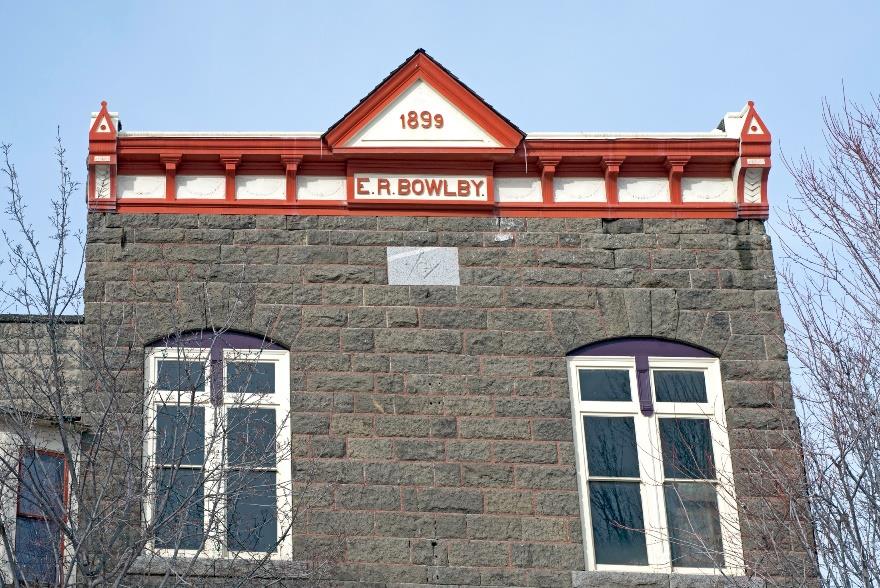 Bowlby Stone on the Bowlby Building in Enterprise was created in the Wapshilla Ridge flow. Photo by Ellen Morris Bishop.