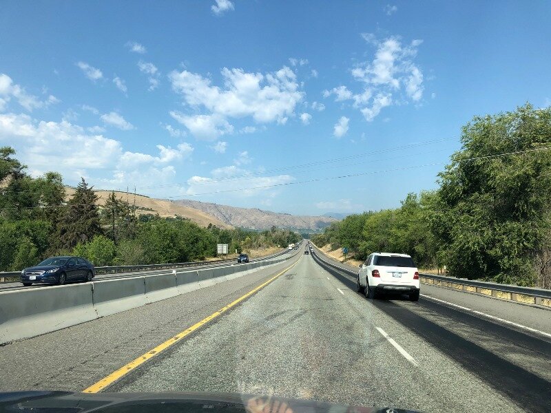  The road (US 2 and 97) to Cashmere with the buff colored hills of the Chumstick Formation in the distance. 
