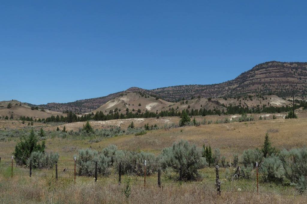  Monument dikes can be seen down the spines of the hills 