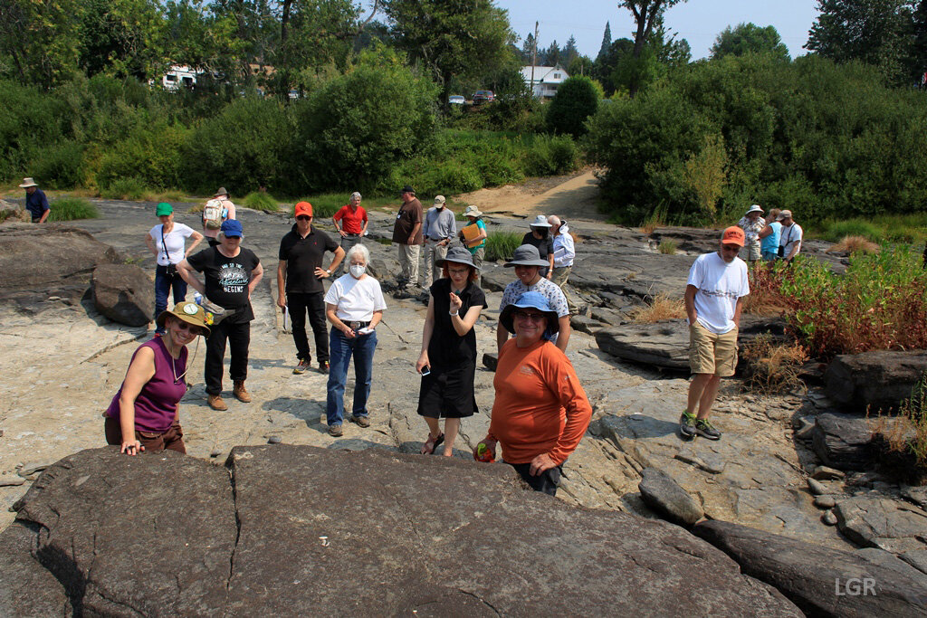  The group is delighted to examine the river bedrock of Tyee sandstone. 