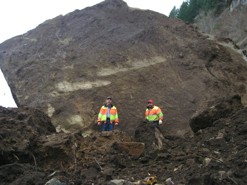  A couple of workmen give a nice scale for the size of the rockfall. 