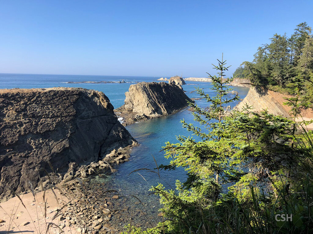  This is what we missed by not hiking around the cliffs to Sunset Bay. This picture was from Labor Day weekend 2020. We had a gorgeous day before the state of Oregon was set ablaze. 