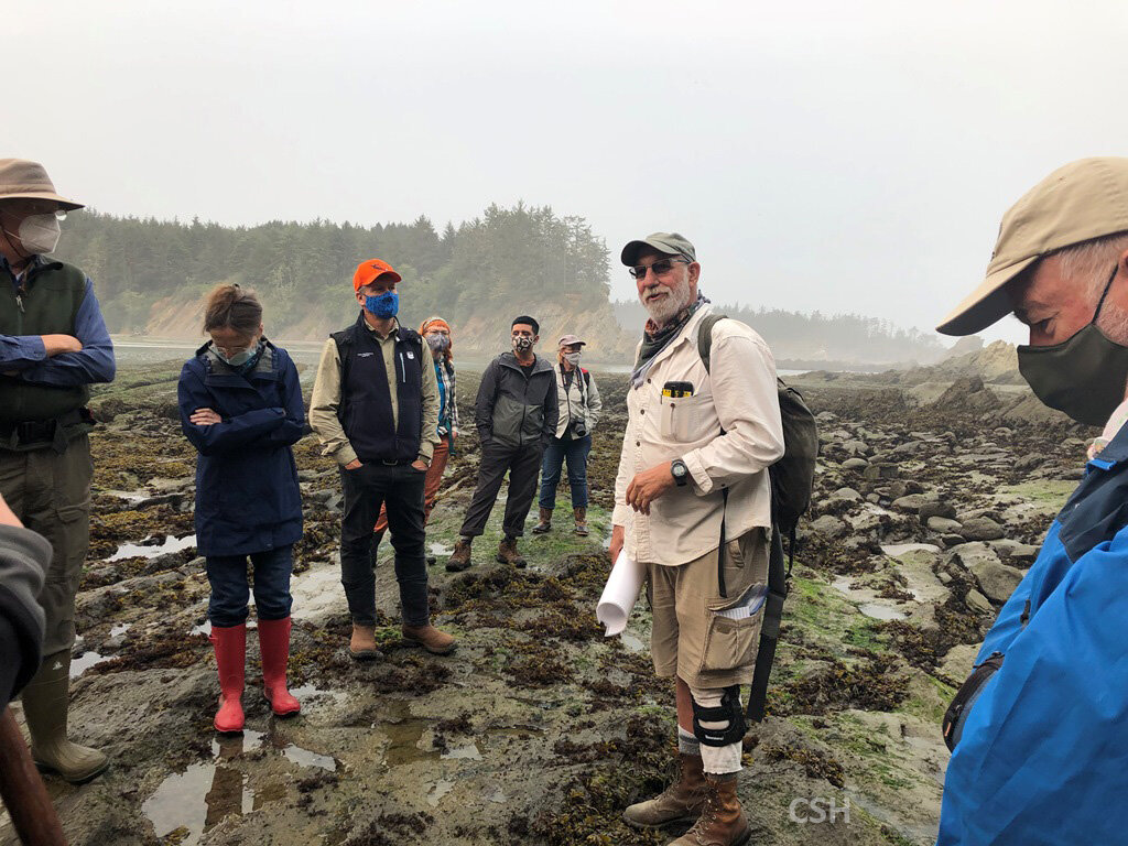  Dave Blackwell discussing the strike-slip faults running through the bay. Each cove or bay in the Cape Arago headland was created by faulting. 