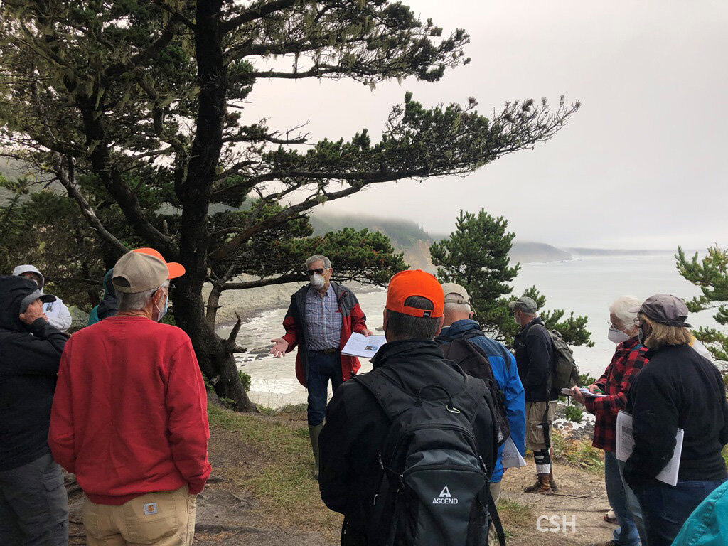  We arrive at the Cape Arago parking lot and John talks about the channel forms in the walls of the South Cove. 