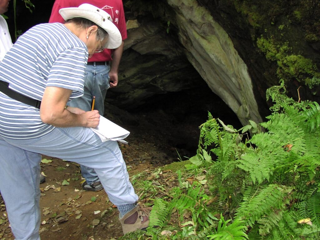  Bev taking notes at Tunnel Point cave entrance, 2003. 