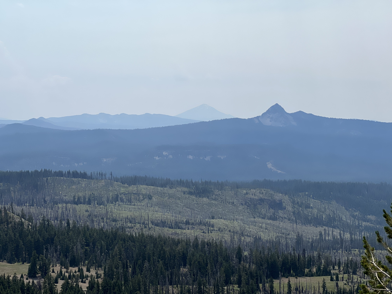  From the Watchman Flow of Stop 6, we could look to the southwest and see Union Peak and Mt. McLoughlin in the distance. Mt. Shasta was not visible due to fire smoke haze in the atmosphere. 
