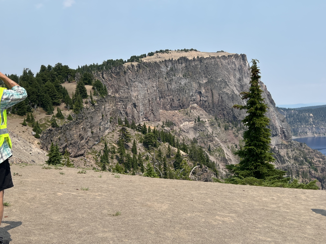  Stop 7 - Llao Rock Overlook. Llao Rock was a dacite flow that occurred just about 200 years before the climactic eruption. It consists of viscous, glassy rhyodacite.  