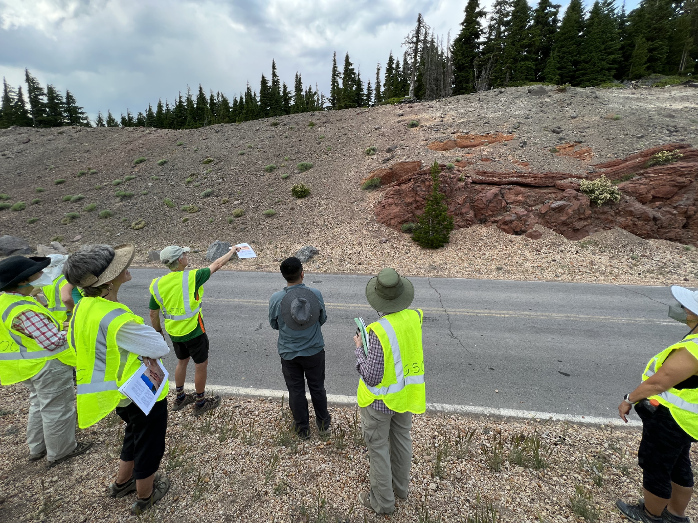  Lee discusses the pumice outcrop. 