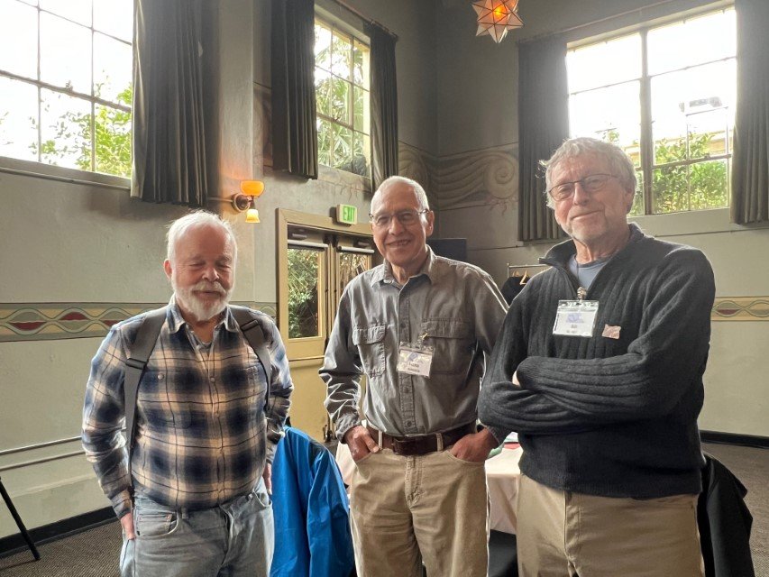  Denny Chamberlin, Herb Dirksen, and Bill Burgel converse. 
