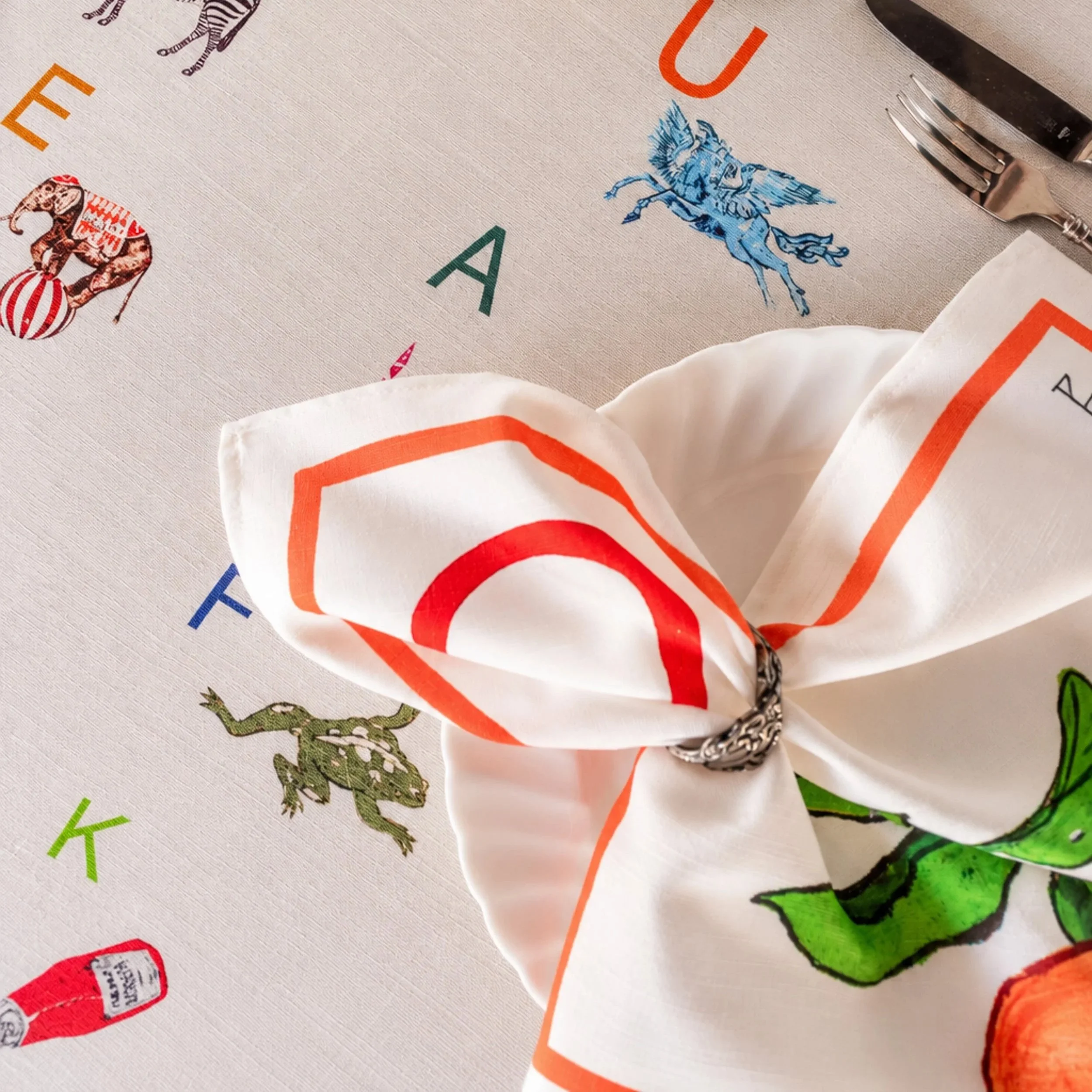 Close-up of a colorful illustrated poster featuring various food items, illustrations, and text.
